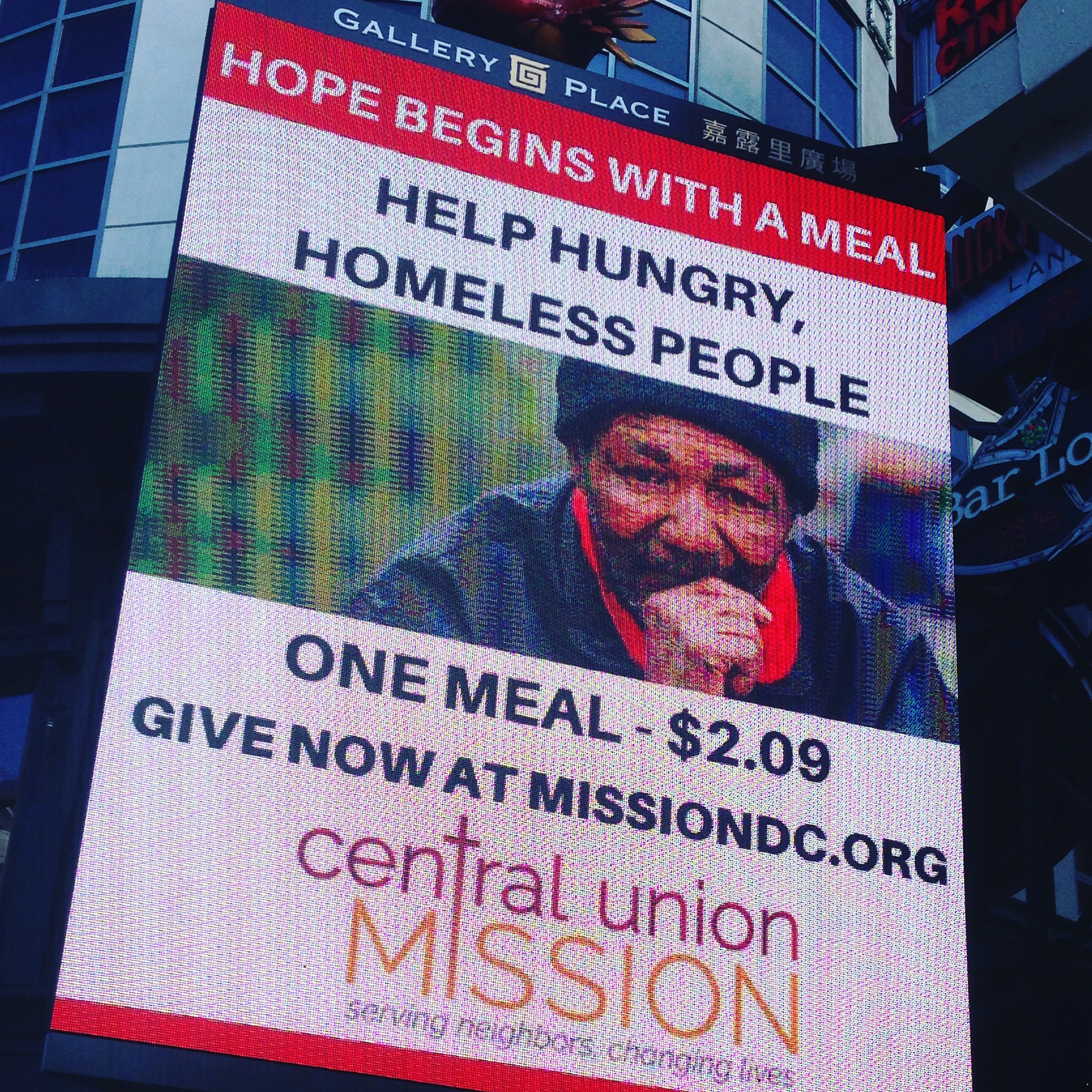 Close-up of the Central Union Mission One Million Meals campaign billboard